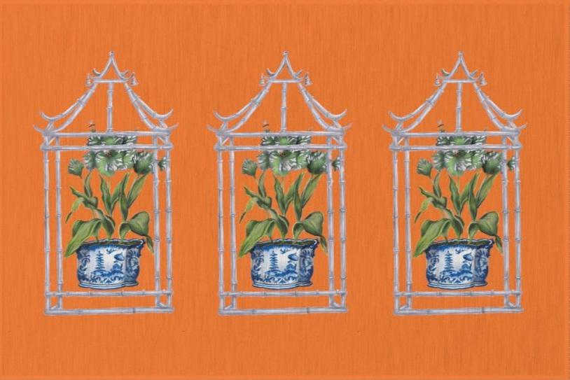 Photo of an orange rug with three pagodas. Each pagoda has a plant in a blue chinoiserie painted pot inside.