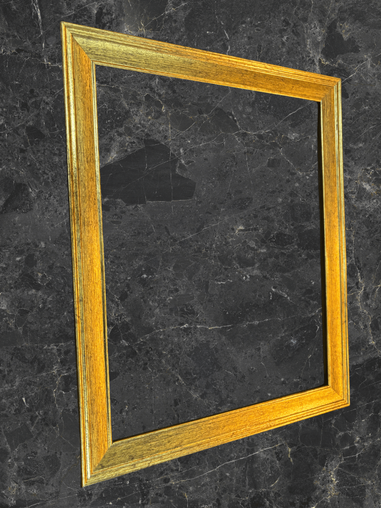 Photo of an antique gold-finished frame against a black granite countertop