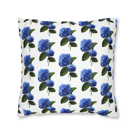 Photo of a throw pillow with a blue  hydrangea patterned design