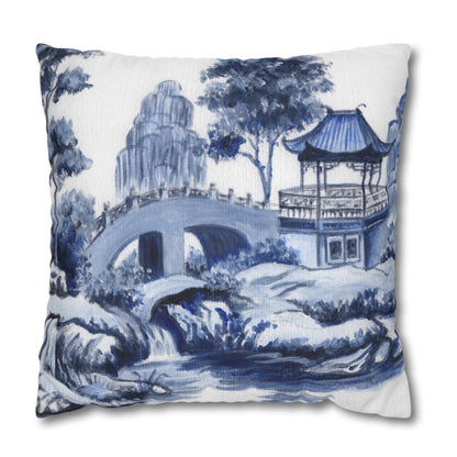 Photo of a throw pillow with a Chinoiserie pagoda scene in blue