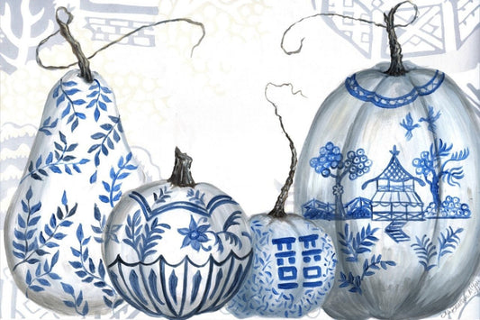 Photo of a rectangular paper placemat with blue and white chinoiserie designs painted on pumpkins and squash