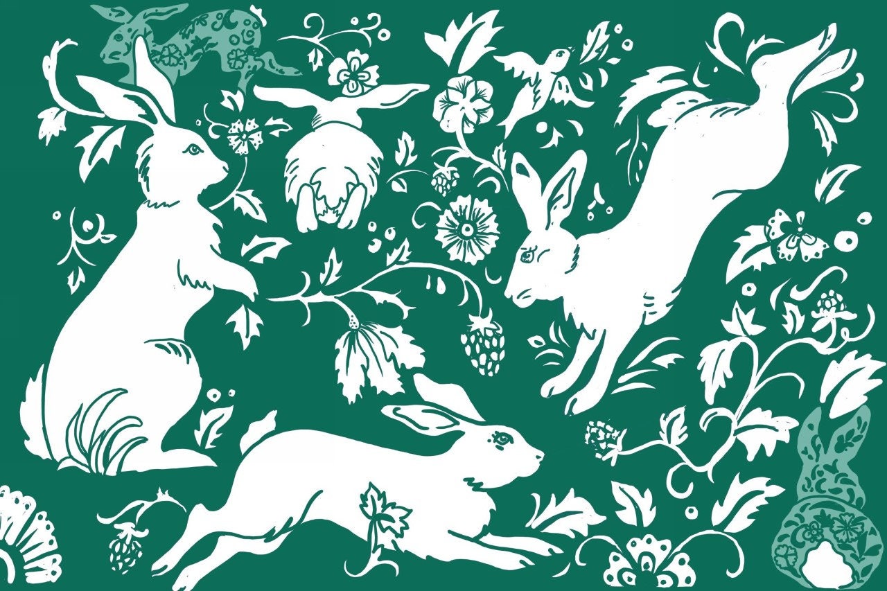 Photo of hunter green paper placemat with bunny artwork