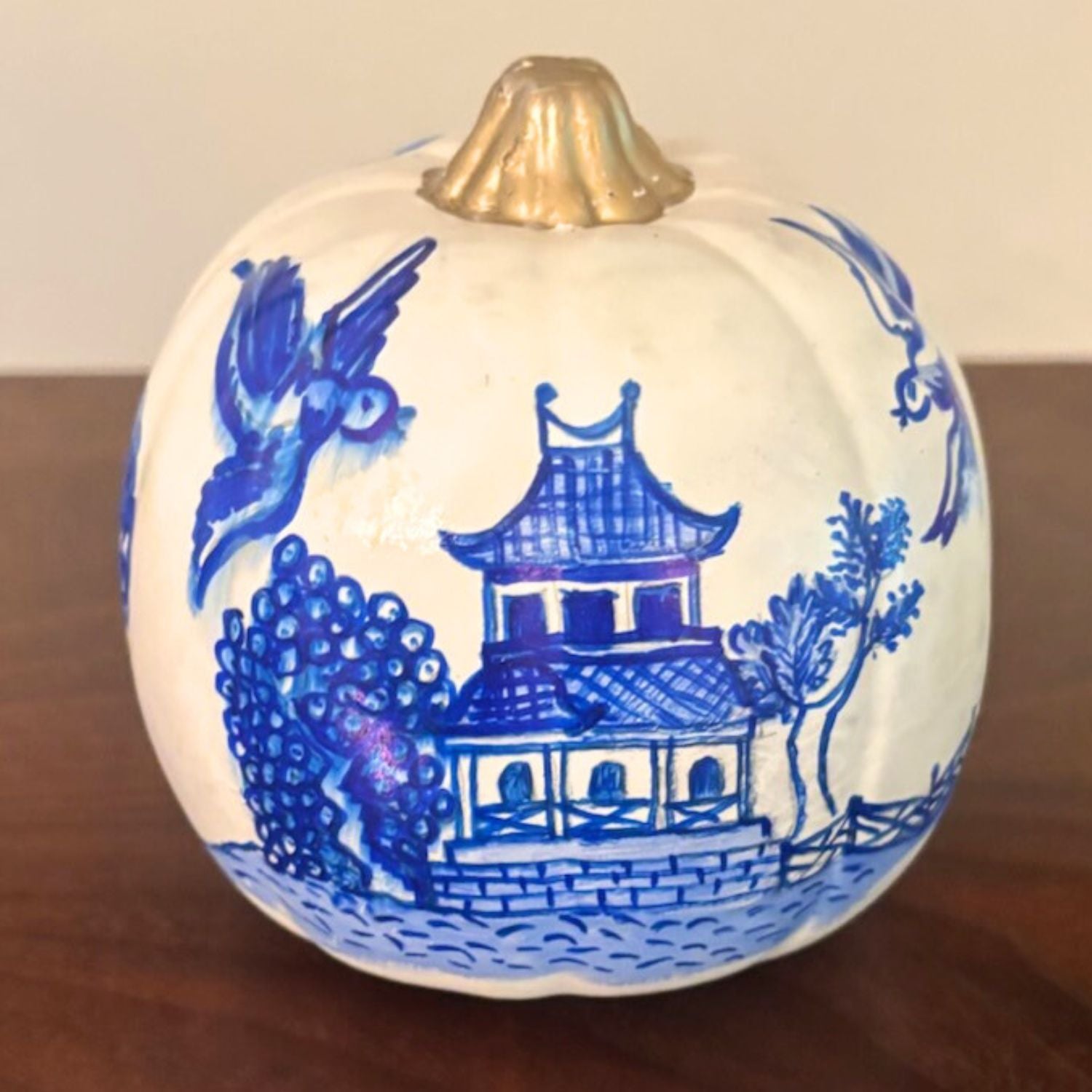 Rear of the blue and white chinoiserie pumpkin, showing additional willow tree, birds, and landscape detail.