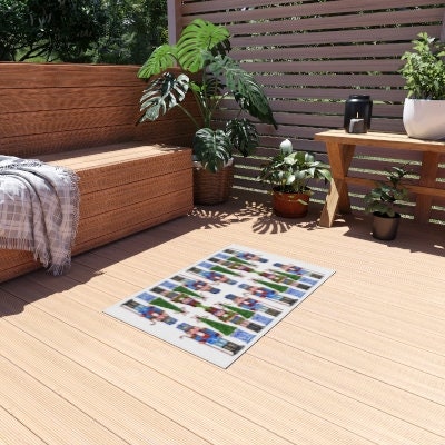 Photo of a whimsical holiday rug with a white background featuring nutcrackers holding candy cane staffs and Christmas trees with a chinoiserie base. The rug is outdoors in front of a wooden bench.