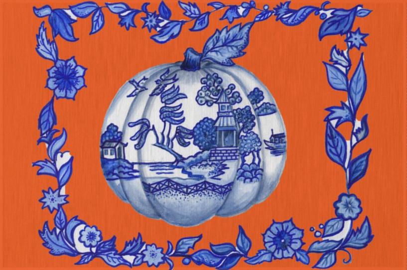 Photo of an orange rug with a chinoiserie painted pumpkin and blue flower artwork border