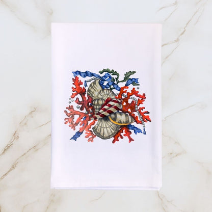 White Hill & Dale Home tea towel featuring Dale Barattini McLin artwork of sunset coral, seashells, pearls, and blue ribbon accents on a light marble background.
