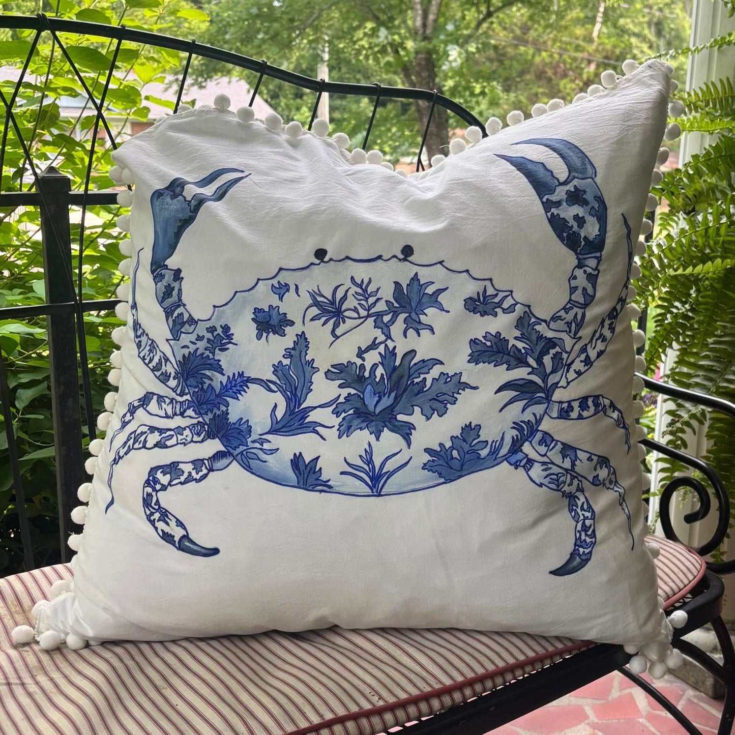 blue and white chinoiserie crab hand-painted throw pillow with white pom pom trim