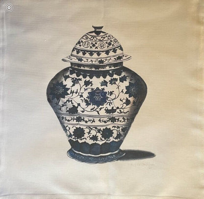 Photo of a white tea towel with a blue floral chinoiserie vase design